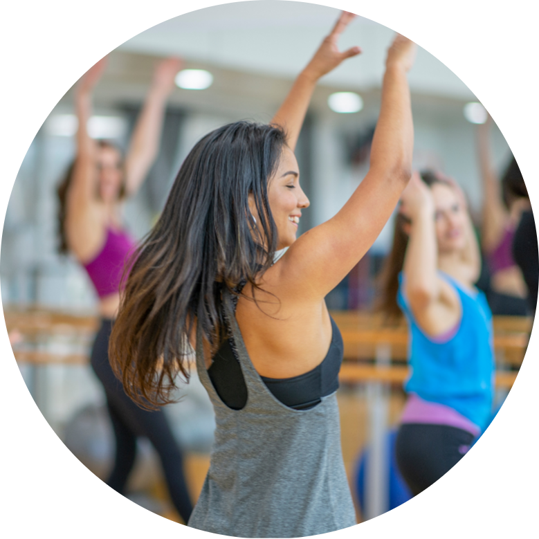 Women dancing together during a Chakradance-inspired movement session