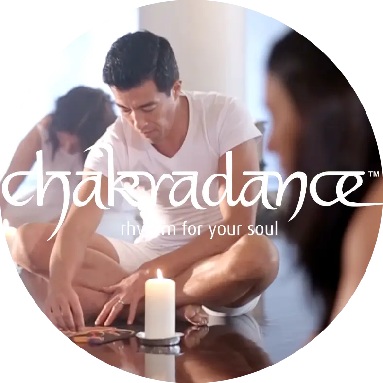 Person creating mandala art as part of a Chakradance session
